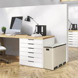 Beiger Mülleimer Clean 9 mit zwei Deckelöffnungen neben einem Schreibtisch von hjh OFFICE