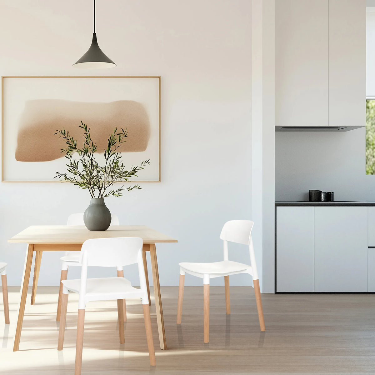 Vierfußstuhl SCANDI E in Weiß mit hellen Holzbeinen in einem Essbereich von hjh LIVING