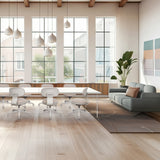 Homeoffice-Bürostuhl SITMOTION W in Grau mit Rollen und Armlehnen in einem hellen Raum von hjh OFFICE