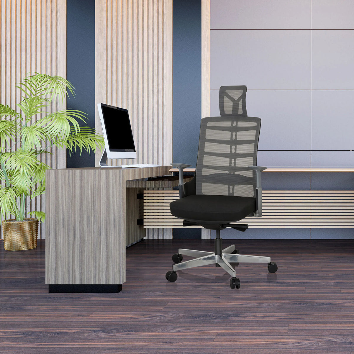 High-End-Bürostuhl SKARIF in Schwarz-Grau vor einem Schreibtisch im modernen Büro von hjh OFFICE